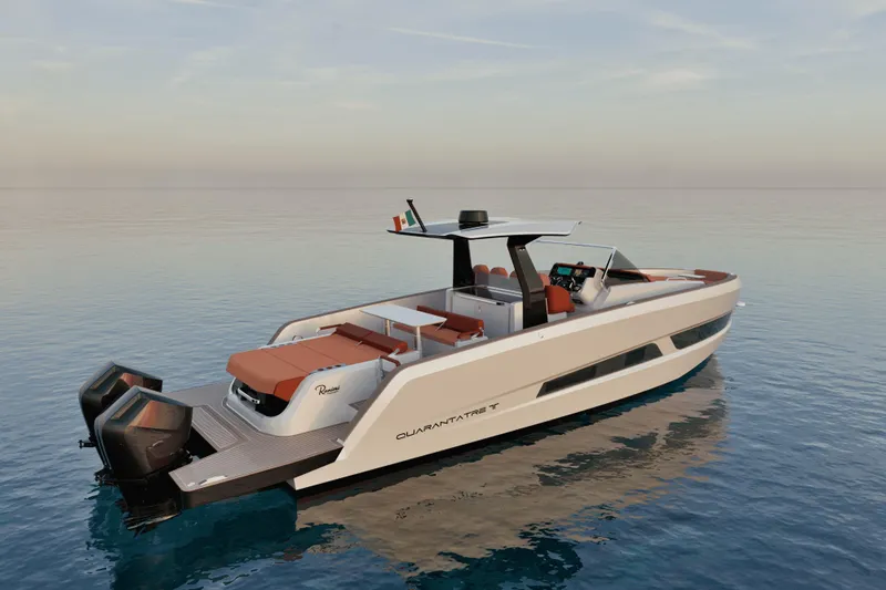  Yacht Photos Pics 2026 Ranieri QUARANTATRE TT luxury boat on calm water at sunset.