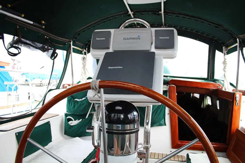 Divine Miss Em Yacht Photos Pics Cockpit of 1990 Slocum 43 sailboat with Garmin navigation equipment.