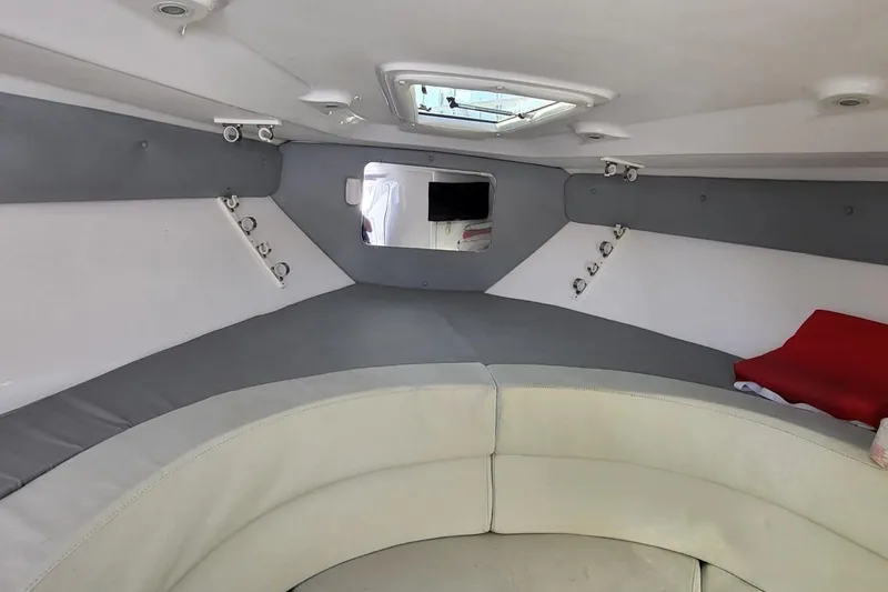  Yacht Photos Pics Interior of a 2007 Intrepid 370 Cuddy boat, featuring a cozy seating area.