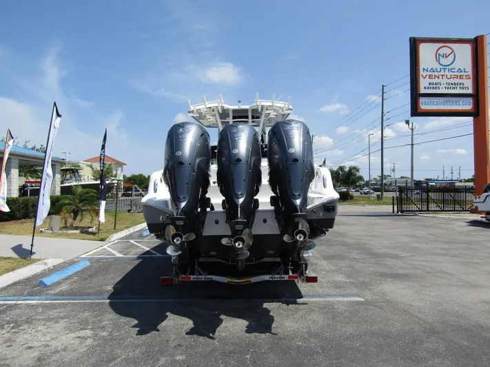  Yacht Photos Pics 2024 Wellcraft 352 Fisherman boat with triple outboard engines at Nautical Ventures.