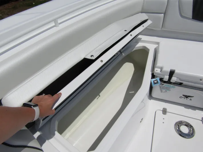  Yacht Photos Pics 2024 Wellcraft 352 Fisherman boat storage compartment and cooler.
