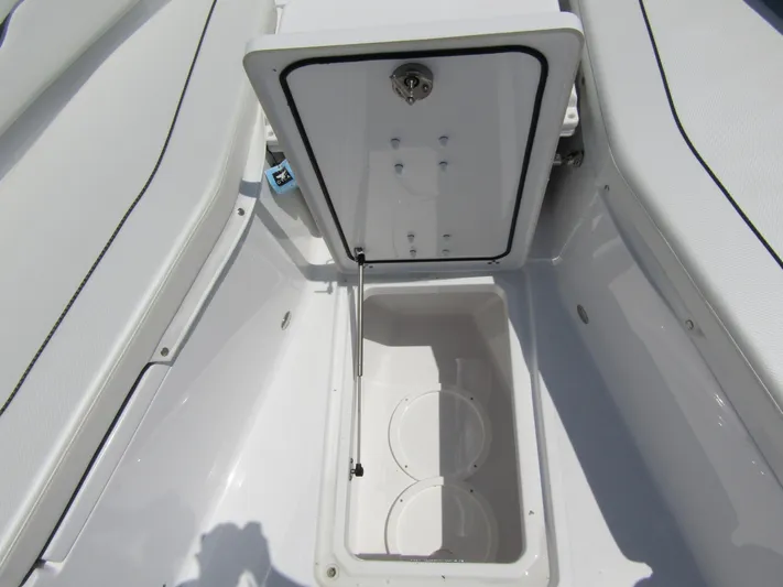  Yacht Photos Pics 2024 Wellcraft 352 Fisherman storage compartment with open hatch.