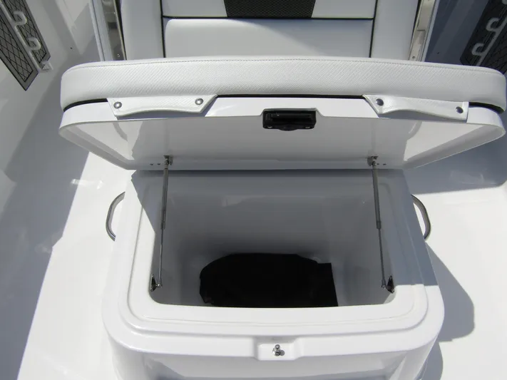  Yacht Photos Pics 2024 Wellcraft 352 Fisherman boat storage compartment with open lid.