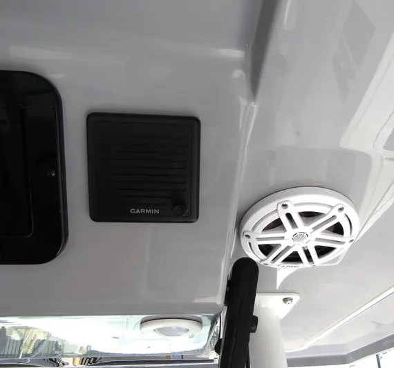  Yacht Photos Pics 2024 Wellcraft 352 Fisherman boat ceiling with Garmin speaker and white marine speaker.