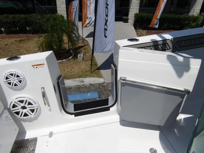  Yacht Photos Pics 2024 Wellcraft 352 Fisherman boat deck with open side door and speakers.