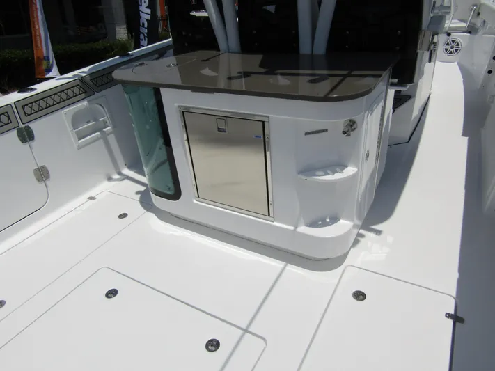  Yacht Photos Pics 2024 Wellcraft 352 Fisherman boat interior with storage and counter space.