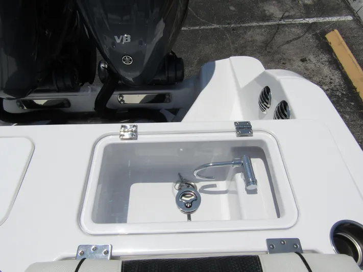  Yacht Photos Pics 2024 Wellcraft 352 Fisherman boat with dual outboard engines and livewell.