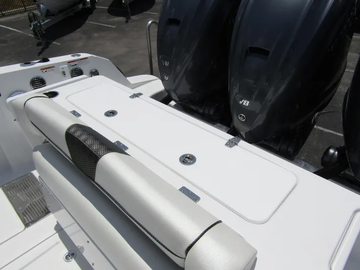  Yacht Photos Pics 2024 Wellcraft 352 Fisherman boat with dual outboard engines and cushioned seating.