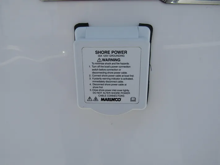  Yacht Photos Pics Shore power connection on a 2024 Wellcraft 352 Fisherman boat.