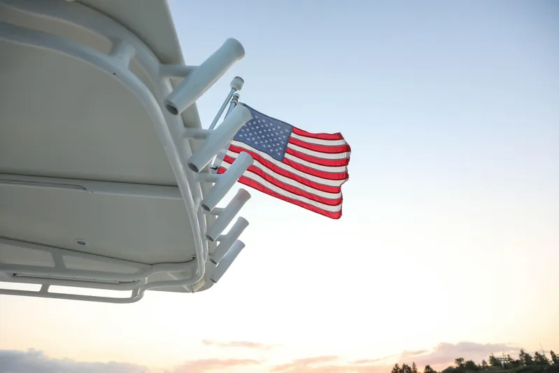  Yacht Photos Pics American flag on 2008 Midnight Express 37 boat at sunset.