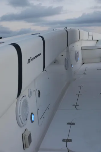  Yacht Photos Pics 2008 Midnight Express 37 boat interior with white seating and speaker system.