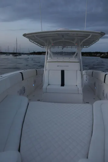  Yacht Photos Pics 2008 Midnight Express 37 boat on calm water at dusk.