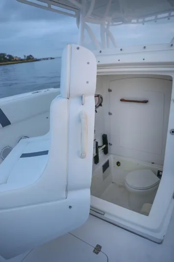  Yacht Photos Pics 2008 Midnight Express 37 boat interior with compact marine toilet.