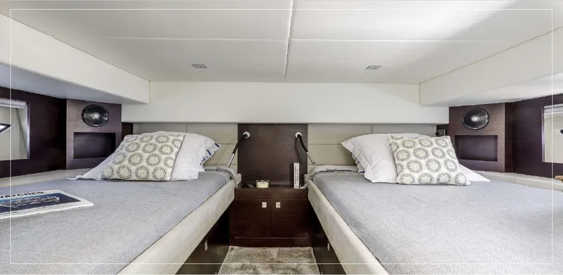 Stanislas Michel Yacht Photos Pics Interior of 2016 SACS Strider 18 yacht with twin beds and modern decor.