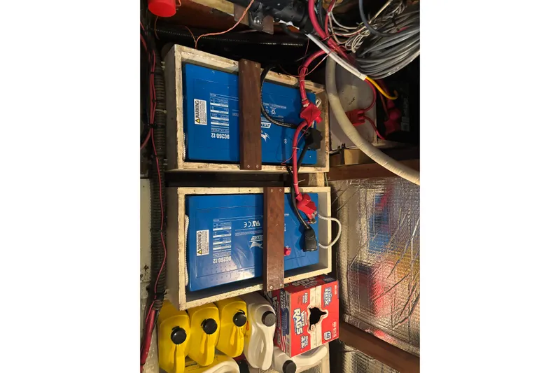 Oasis Yacht Photos Pics Batteries and wiring inside a 1987 Wilbur 38 boat engine compartment.