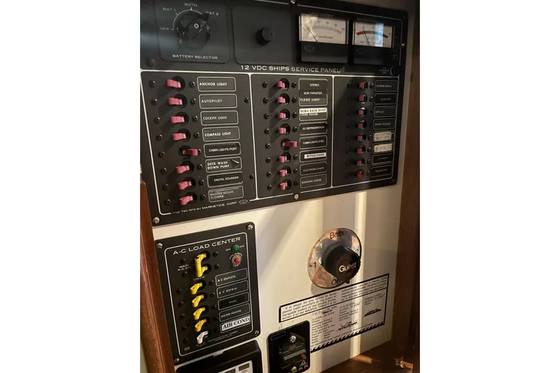 Oasis Yacht Photos Pics Electrical control panel on a 1987 Wilbur 38 boat, featuring switches and gauges.
