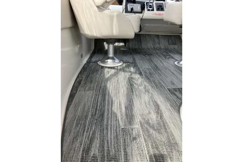 25 Knots Yacht Photos Pics Interior of 2001 Regal Commodore 3780 boat with modern flooring and seating.