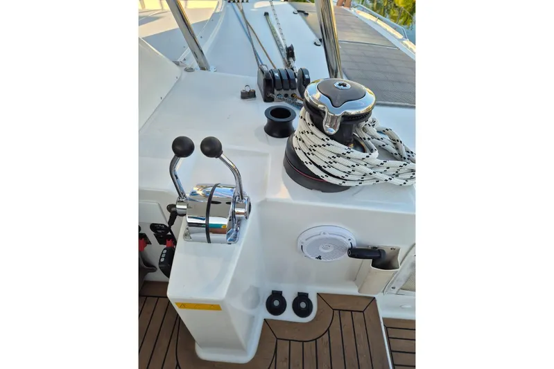Chapter Two Yacht Photos Pics Helm station of 2014 Lagoon 450 catamaran with winch and throttle controls.
