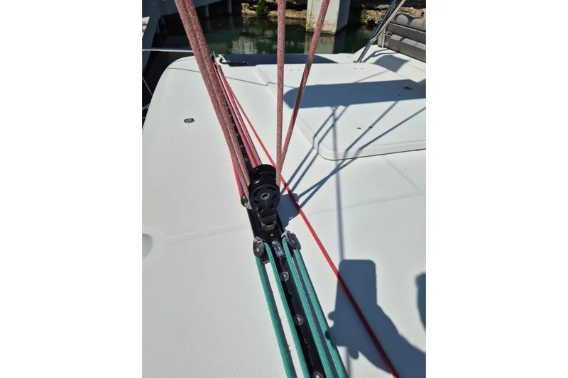 Chapter Two Yacht Photos Pics Close-up of 2014 Lagoon 450 sailboat deck with rigging and ropes.