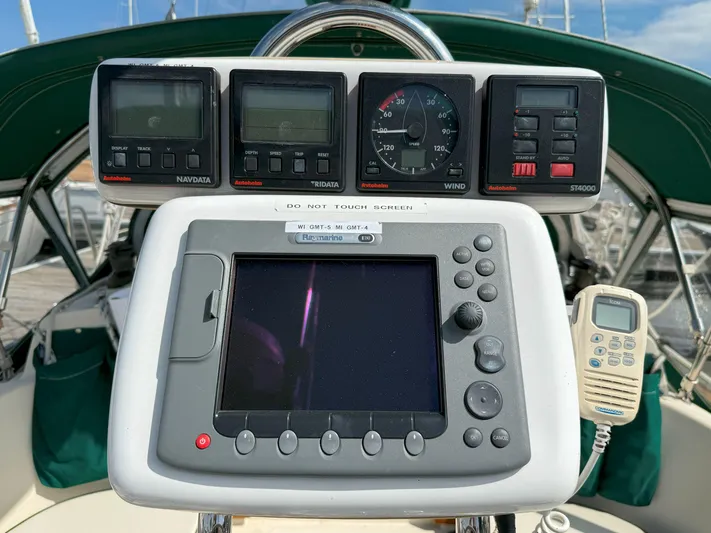 Dalliance Yacht Photos Pics Sailboat cockpit with navigation instruments, Pacific Seacraft Crealock 34, 1993 model.