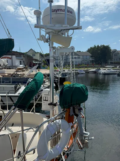 Dalliance Yacht Photos Pics Sailboat docked at marina, featuring Raymarine equipment, Pacific Seacraft Crealock 34, 1993 model.