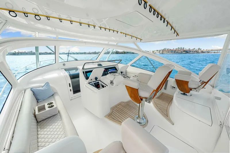 Bad Habit Yacht Photos Pics Luxurious 2012 Viking 42 Open yacht interior with plush seating and ocean view.