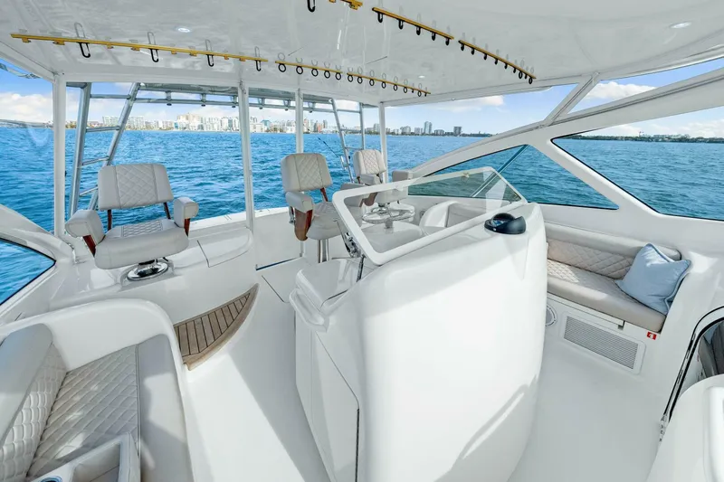 Bad Habit Yacht Photos Pics Interior of 2012 Viking 42 Open yacht with luxurious seating and ocean view.