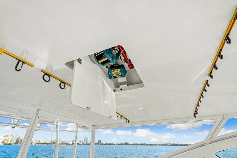 Bad Habit Yacht Photos Pics 2012 Viking 42 Open boat interior with rod holders and equipment storage.