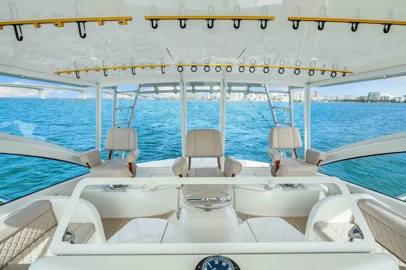 Bad Habit Yacht Photos Pics Luxurious 2012 Viking 42 Open yacht interior with ocean view and elegant seating.