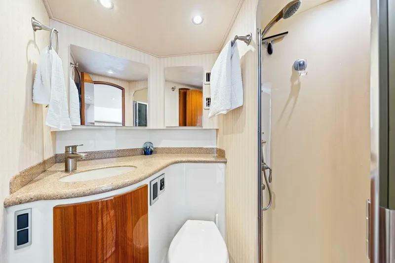 Bad Habit Yacht Photos Pics Luxurious bathroom in 2012 Viking 42 Open yacht with modern fixtures and shower.