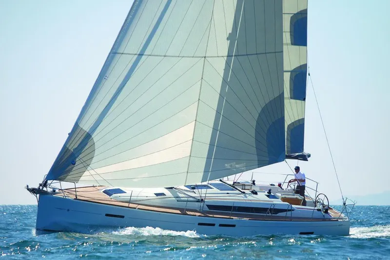 Urkab Yacht Photos Pics Manufacturer Provided Image: 2018 Jeanneau Sun Odyssey 449 sailing on open water.