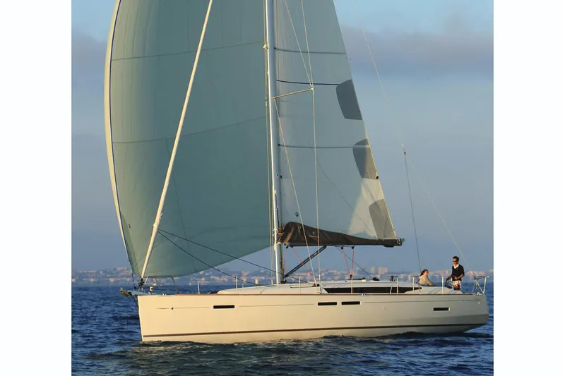 Urkab Yacht Photos Pics Manufacturer Provided Image: 2018 Jeanneau Sun Odyssey 449 sailing on open water.
