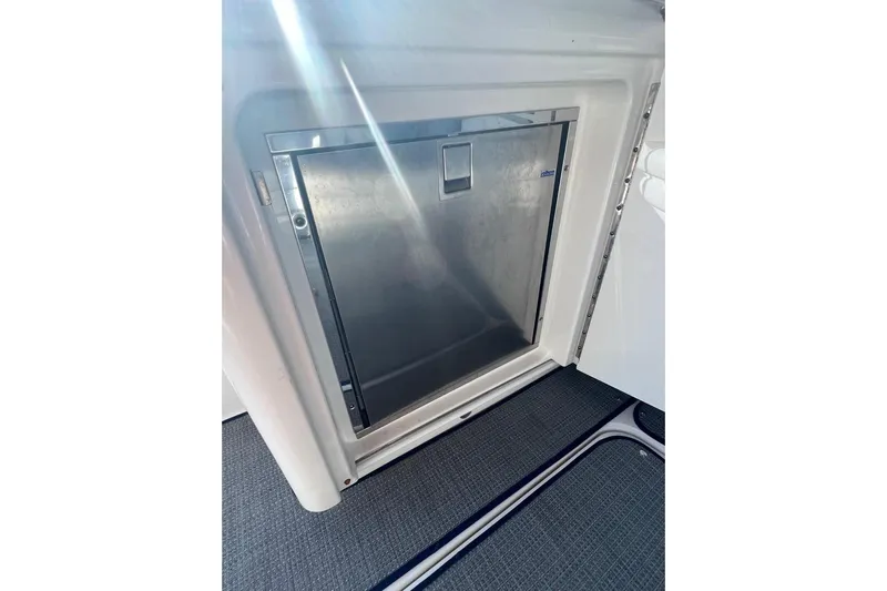  Yacht Photos Pics Stainless steel refrigerator on 2014 Sea Ray 410 Sundancer yacht interior.