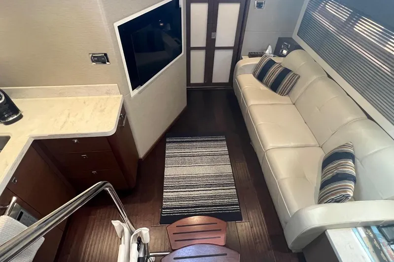  Yacht Photos Pics Luxurious interior of 2014 Sea Ray 410 Sundancer yacht with modern furnishings.