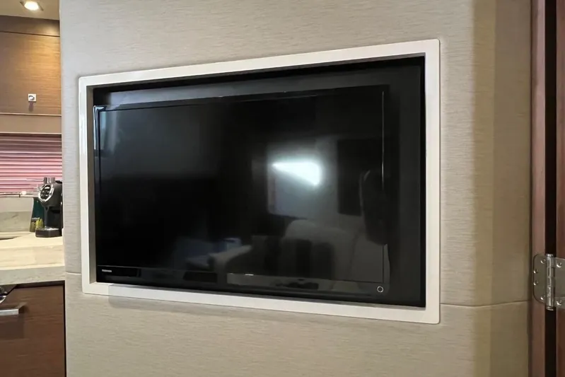  Yacht Photos Pics Built-in TV on 2014 Sea Ray 410 Sundancer yacht interior.