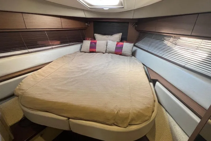  Yacht Photos Pics Luxurious cabin interior of 2014 Sea Ray 410 Sundancer yacht with cozy bed.