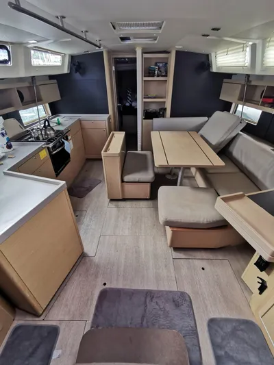 Siman H Yacht Photos Pics 2020 Beneteau Oceanis 46.1 interior with modern kitchen and dining area.