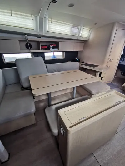 Siman H Yacht Photos Pics 2020 Beneteau Oceanis 46.1 interior with modern dining area and seating.