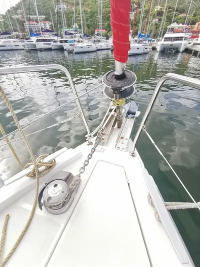 Siman H Yacht Photos Pics Beneteau Oceanis 46.1 sailboat bow, 2020 model, docked in a marina with other boats.