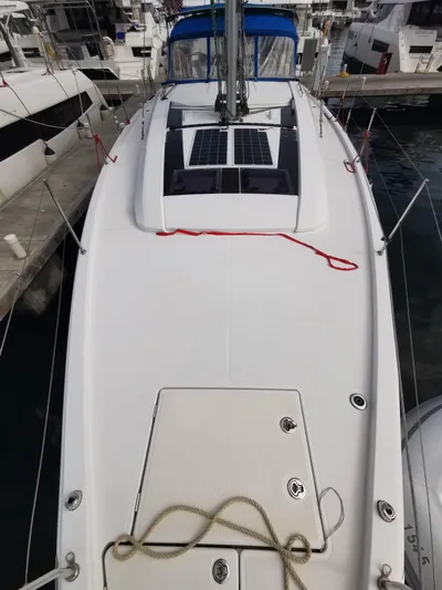Siman H Yacht Photos Pics 2020 Beneteau Oceanis 46.1 sailboat deck with solar panels in marina.