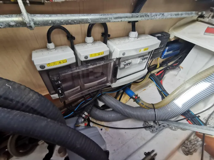 Siman H Yacht Photos Pics Electrical system of 2020 Beneteau Oceanis 46.1 yacht, featuring wiring and control panels.