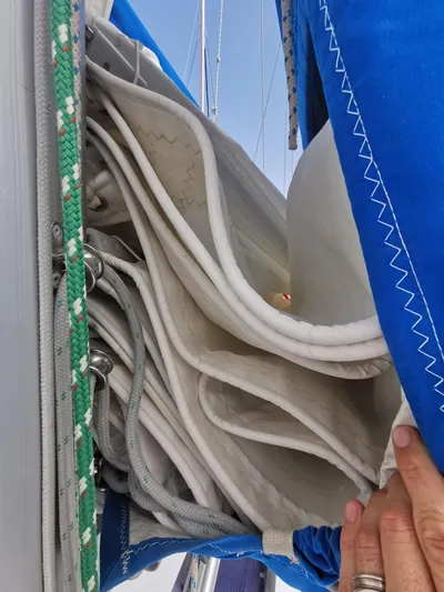 Siman H Yacht Photos Pics Folded sails on a 2020 Beneteau Oceanis 46.1 yacht with blue sail cover.