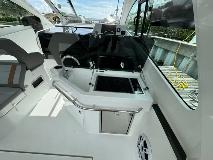  Yacht Photos Pics 2024 Beneteau Gran Turismo 32 yacht interior with sleek design and modern amenities.