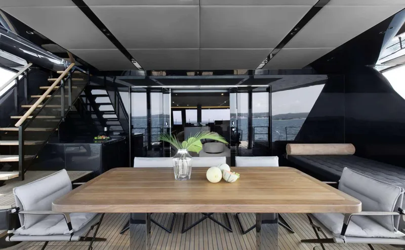 Grayone Yacht Photos Pics Luxurious Sunreef 80 sailing yacht interior with elegant dining area, modern design, and ocean view.