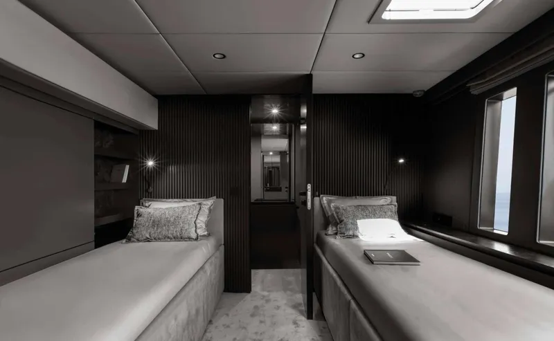 Grayone Yacht Photos Pics Luxurious twin cabin interior of 2020 Sunreef 80 sailing yacht, featuring modern design and elegant decor.