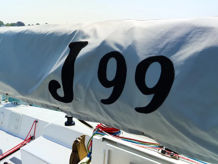  Yacht Photos Pics 2020 J Boats J/99 sailboat with covered boom and visible rigging.
