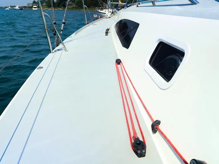  Yacht Photos Pics 2020 J Boats J/99 sailboat deck with red rigging and ocean view.