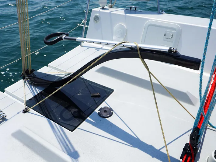  Yacht Photos Pics 2020 J Boats J/99 sailboat cockpit with tiller and ropes on deck.