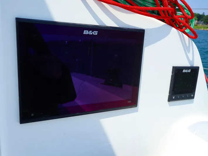  Yacht Photos Pics B&G navigation displays on a 2020 J Boats J/99 sailboat, with colorful ropes nearby.