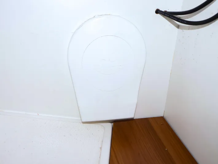  Yacht Photos Pics Interior detail of a 2020 J Boats J/99 sailboat, featuring a white panel and wooden surface.